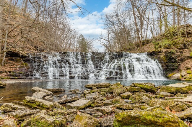 Rutledge Falls has a gorgeous waterfall visitors can play in during the Summer near Tullahoma.