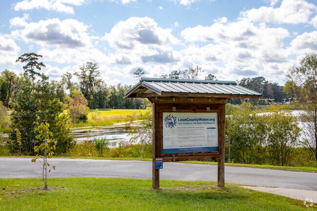 The Broadmore Pond park is a beautiful location with a paved walking path.