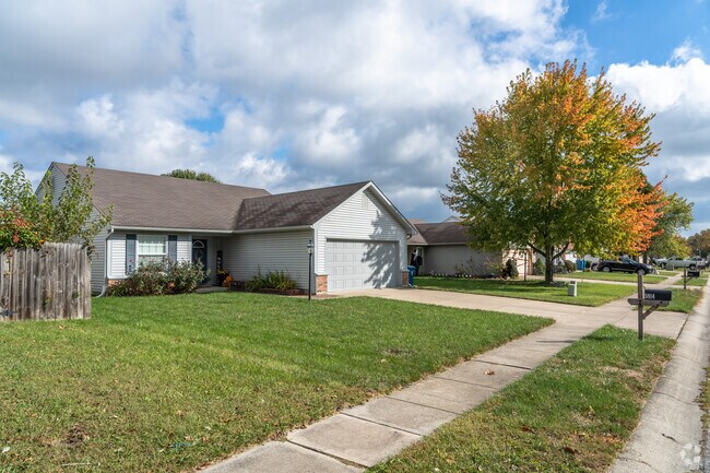 Most homes in West Newton have large front yards on tree-lined streets.