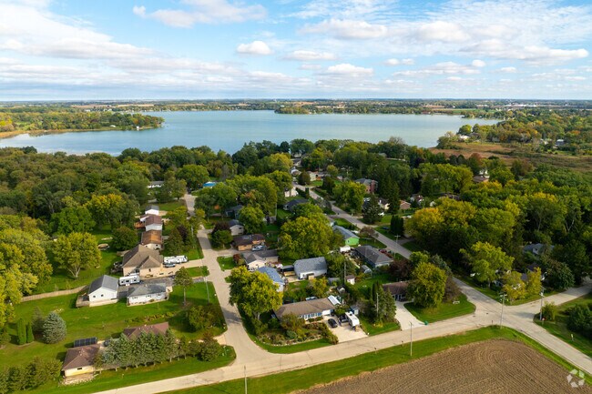 Eagle Lake homes sit between farmland and the lake’s blue shoreline.