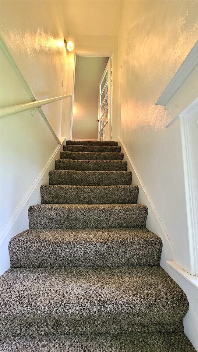 Stairway to upstairs unit
