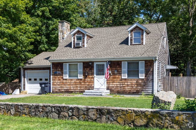 Cape Cod-style homes with stone fences can be found in Child Street West.