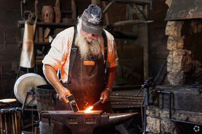 The blacksmiths at the John Deere Museum in Grand Detour shape steel in traditional ways.