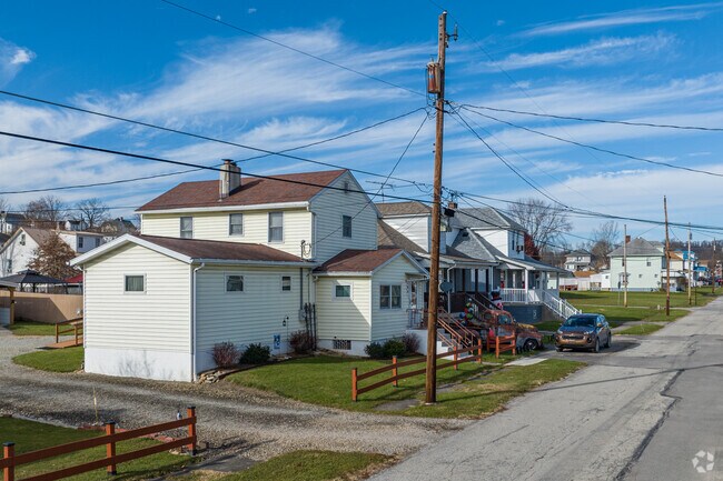 A cluster of homes sits close together on a side street in Masontown.