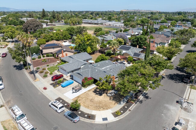 This Shawnee corner captures a peaceful suburban rhythm with tidy homes and winding streets.
