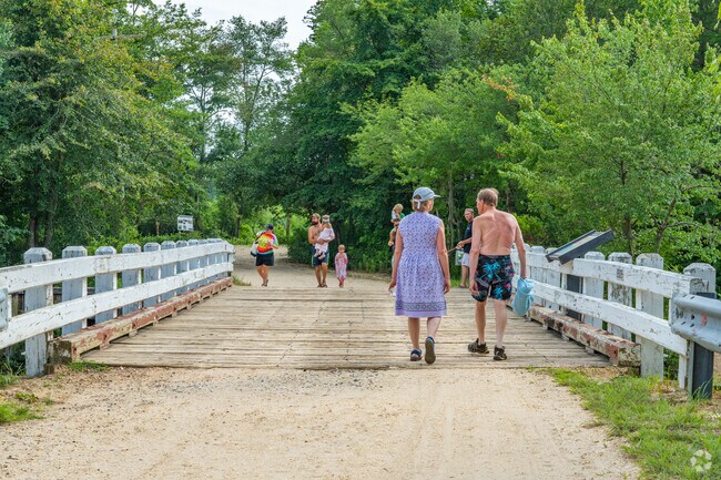 Hiking trails and large green spaces surround Crestwood Village. Double Trouble State Park spans 800 acres to the east, with about 8 miles of trails winding through cedar swamps and pine forests.