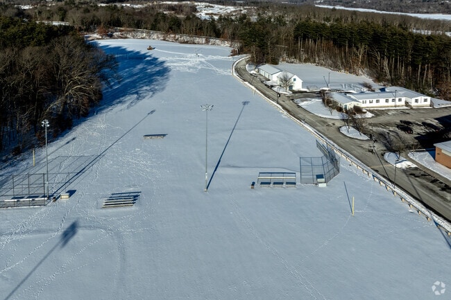 The ball fields are covered in snow at the Pioneer Valley Regional School in Northfield, MA.