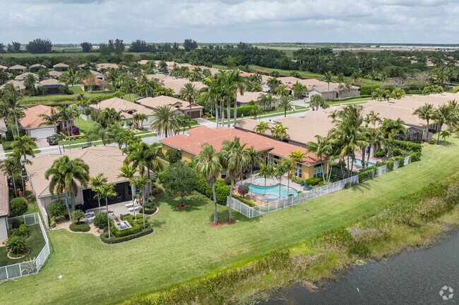 The single family homes in Valencia Cove have large backyards many overlooking the lake.