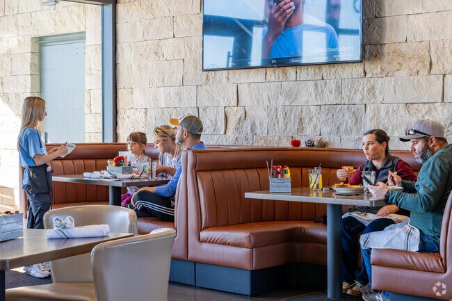 The Lookout at Kickingbird Golf serves various food options to visitors.