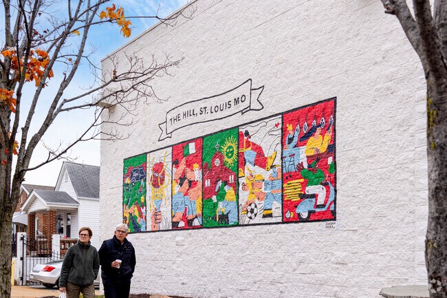 A stroll through The Hill takes you past the iconic mural by Jordan Bauer.