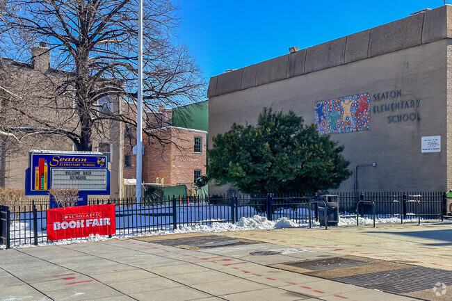 Sign in front of Seaton Elementary School entrance