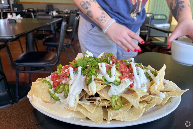 The nacho platter at Saguaro Corners, near Civano, is a local favorite.