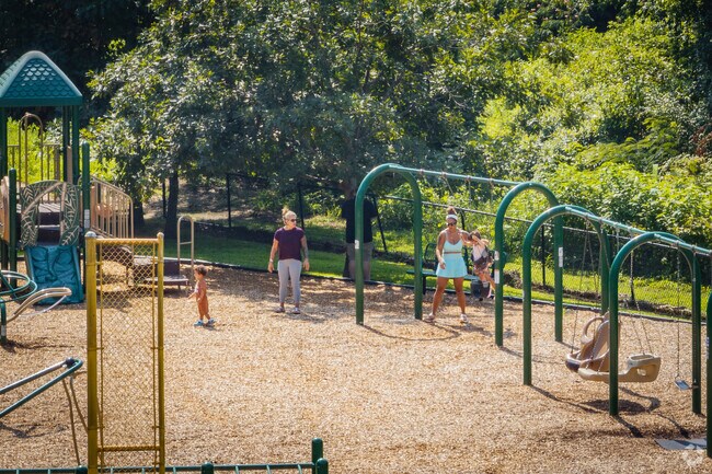 Friends meet and play with their kids at Azalea Park.