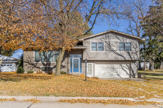 Split-level homes with garages are found in Postville neighborhoods.