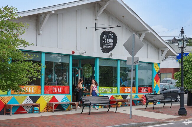 White Heron Tea and Coffee, a cozy West End neighborhood café, serves organic coffee and teas alongside fresh wraps and other café fare in a warm, inviting atmosphere.