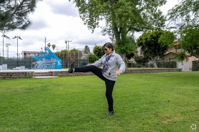 Practice some relaxing tai chi on the beautifully landscaped lawns of Alhambra Park.