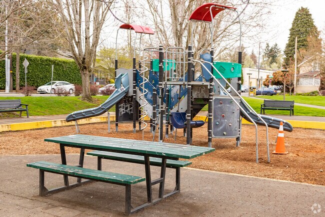 Sit and watch your children play at Sullivan’s Gulch Dog Park & Playground.