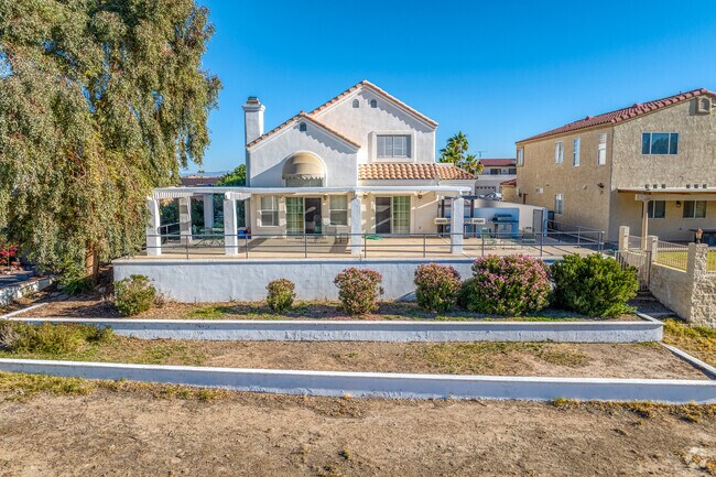 Needles, CA a timeless allure with stucco walls and Spanish-style roof.