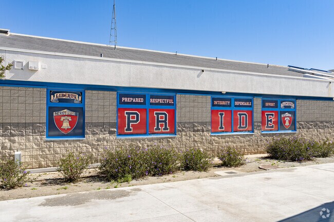 Window signs at Liberty Middle School remind students of their responsibilities.