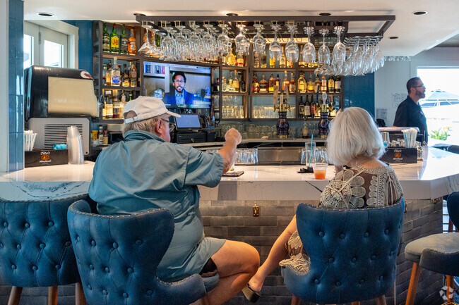 Belly up to the bar at The Turtle Club for a refreshing drink and some appetizers.