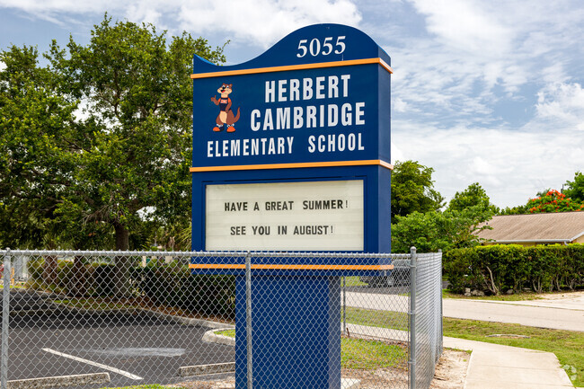 Herbert Cambridge Elementary School in Naples welcomes students with a prominent sign.
