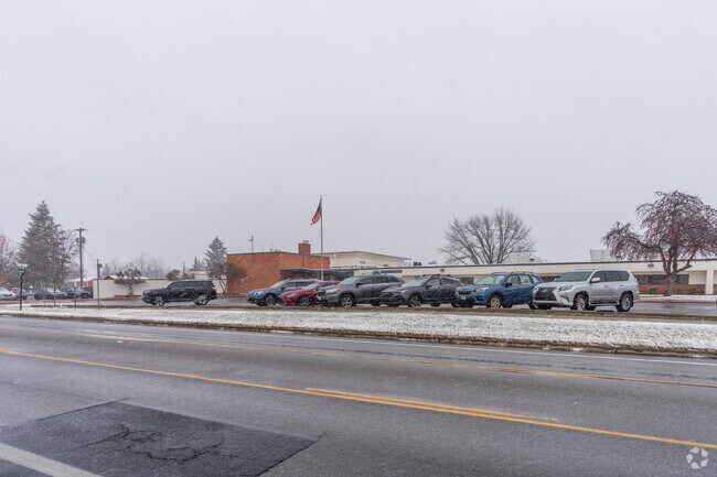 Summit School features a small student drop off loop in front of the school.