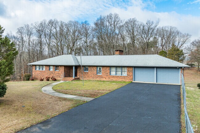 Older ranch-style homes occupy spacious lots in Florence.