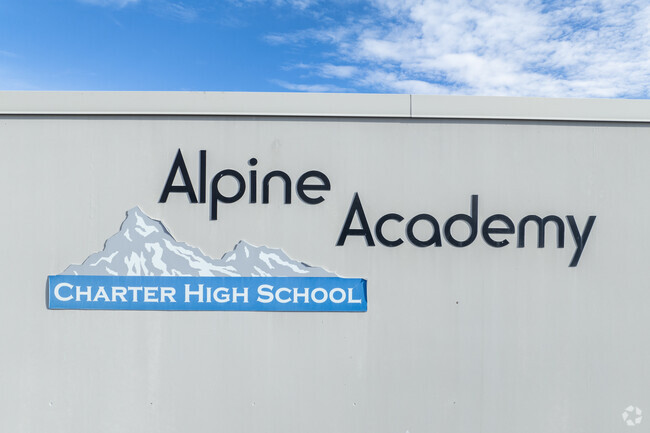 The logo of the Alpine Academy.