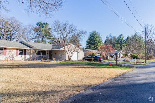 A picturesque row of homes in The Farms showcases one variety of home styles you can find.
