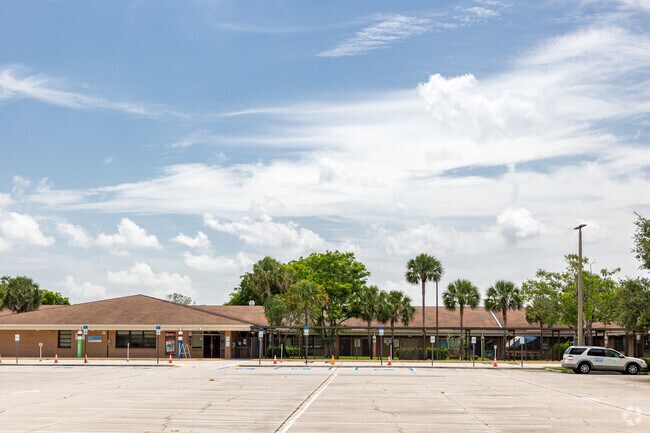 Golden Terrace Elementary School in Naples has a large parking lot in front of the building.