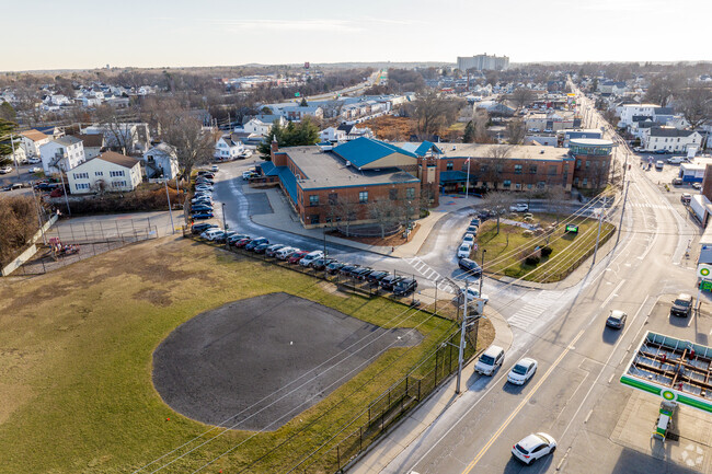 An aerial overview of the Abraham Lincoln Elementary School and it's field in Lowell, MA.