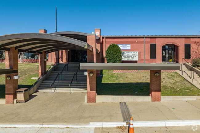 Shaded walkways at Fossil Hill Middle School invite students into a nurturing space.
