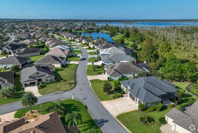 Village of Osceola Hills has beautiful waterfront homes with scenic backyards.