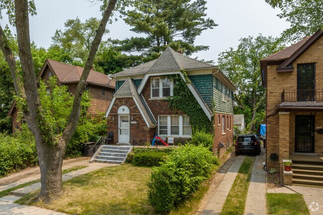 Tudor Home with Arched Stone details in The Eye Neighborhood.