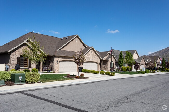 Twin homes in Little Rock Canyon showcase well-maintained exteriors and efficient floor plans for comfortable living.