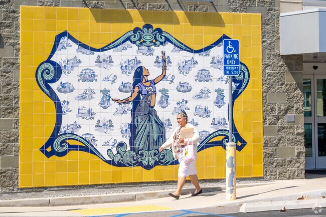 The Artesia Library has a colorful tile wall mosiac.