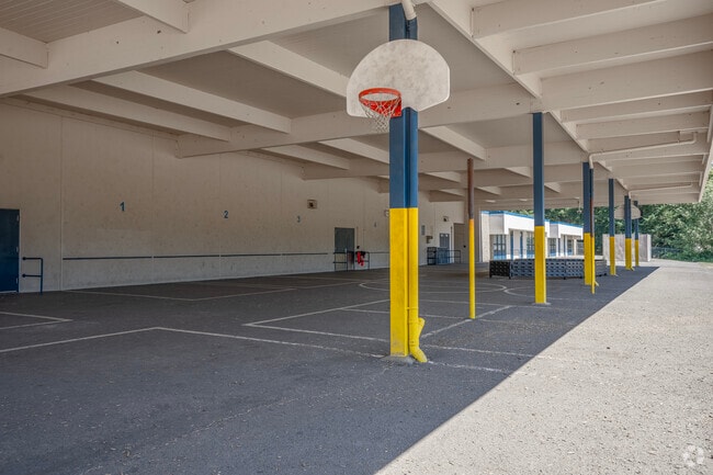 Covered basketball courts at Errol Hassell Elementary School in Beaverton, Oregon.