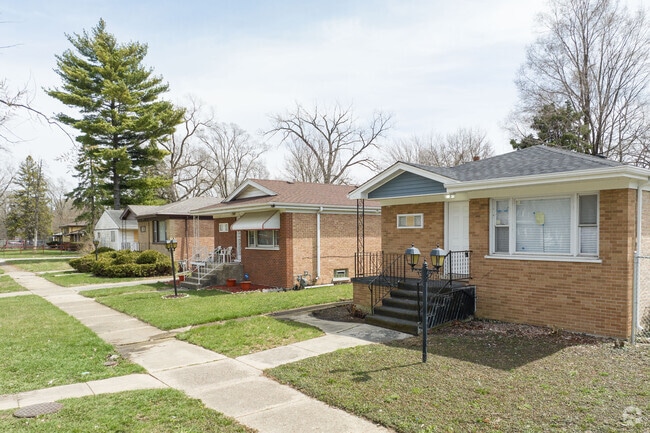 Row of Varying Home Styles Located on Residential Street in Harvey