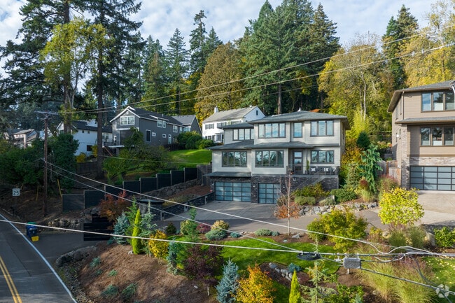 Newly developed contemporary homes run up S Military Rd in Dunthorpe.