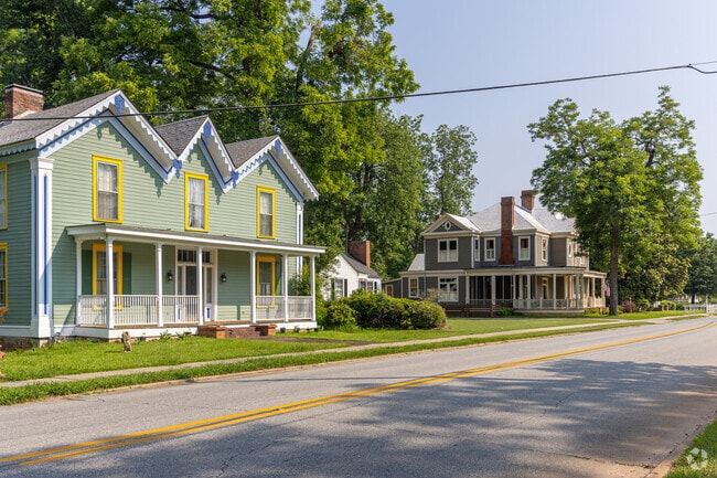 A row of colorful, historic homes lines the streets of Barnesville, Georgia.