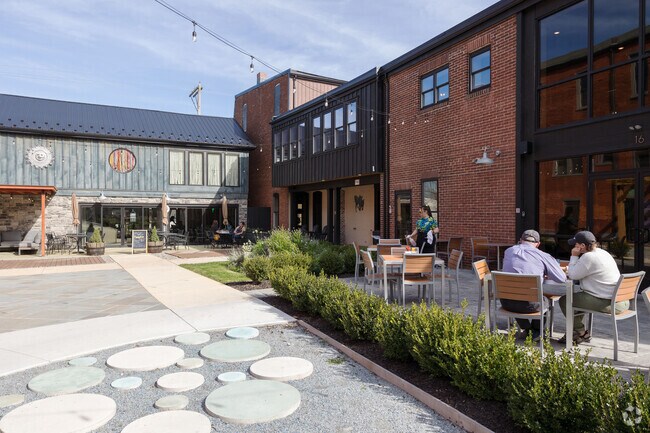 Sign of the Horse is a great local brewery and bar that shares a court yard with Phat Cat Coffee