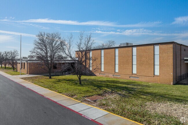 There are several sidewalks along the boarder of West Elementary School.