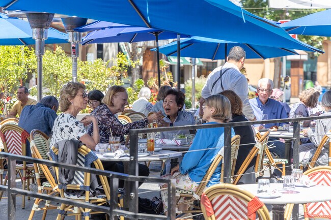 Friends gather in Downtown Menlo Park at Left Bank in Central Menlo Park for a French meal.