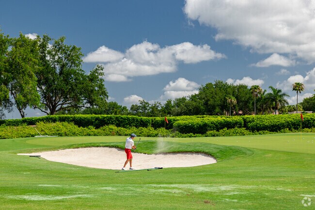 Quail West residents have access to a large golf course with practice and pitching greens.