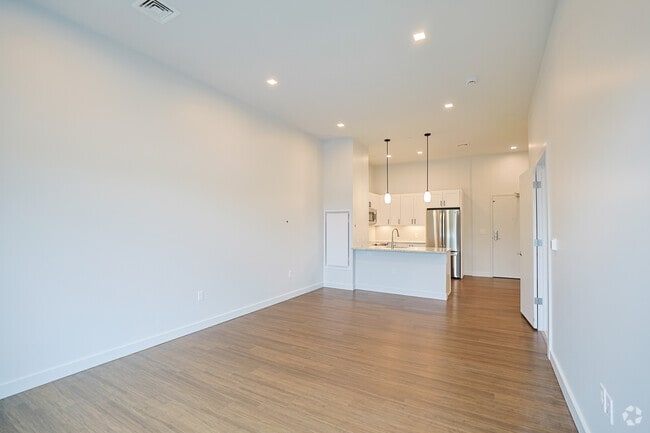 1BR, 1BA - 760SF - Living Room & Kitchen