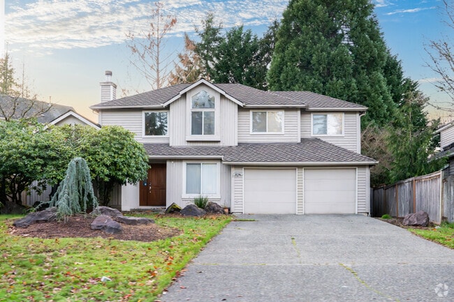 Many two-story multi-family homes in Klahanie feature wood siding on their facades.