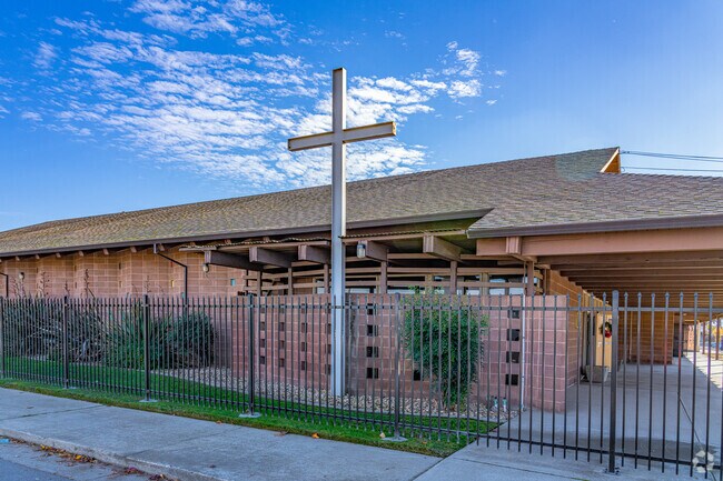 Large cross stands out front of New Testament Christian School.