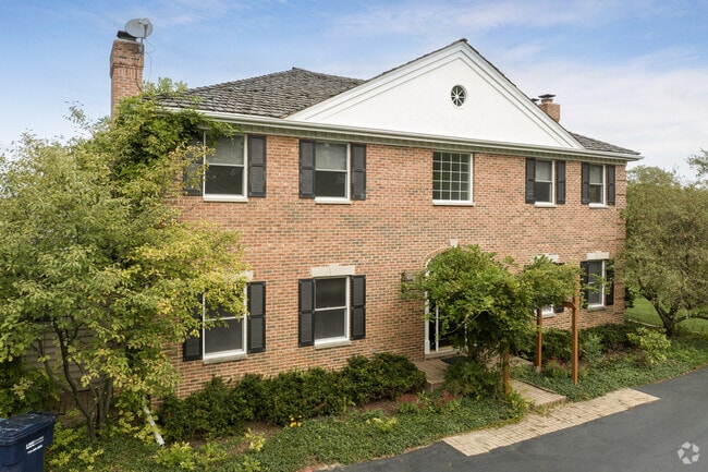 The price for a four-bed, three-bath brick Georgian on a two-and-a-half-acre lot is $1.1M.