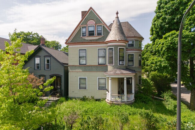 This Queen Anne style home has a tower on its corner.