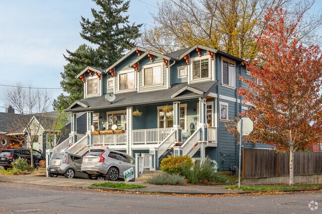 This multi-level Craftsman in East Columbia has a front porch and exposed beams.